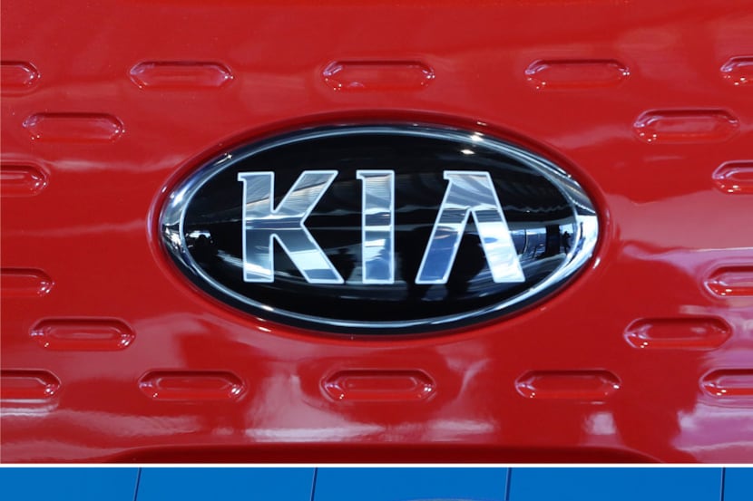 FILE- This combination of file photos shows the logo of Kia Motors during an unveiling...