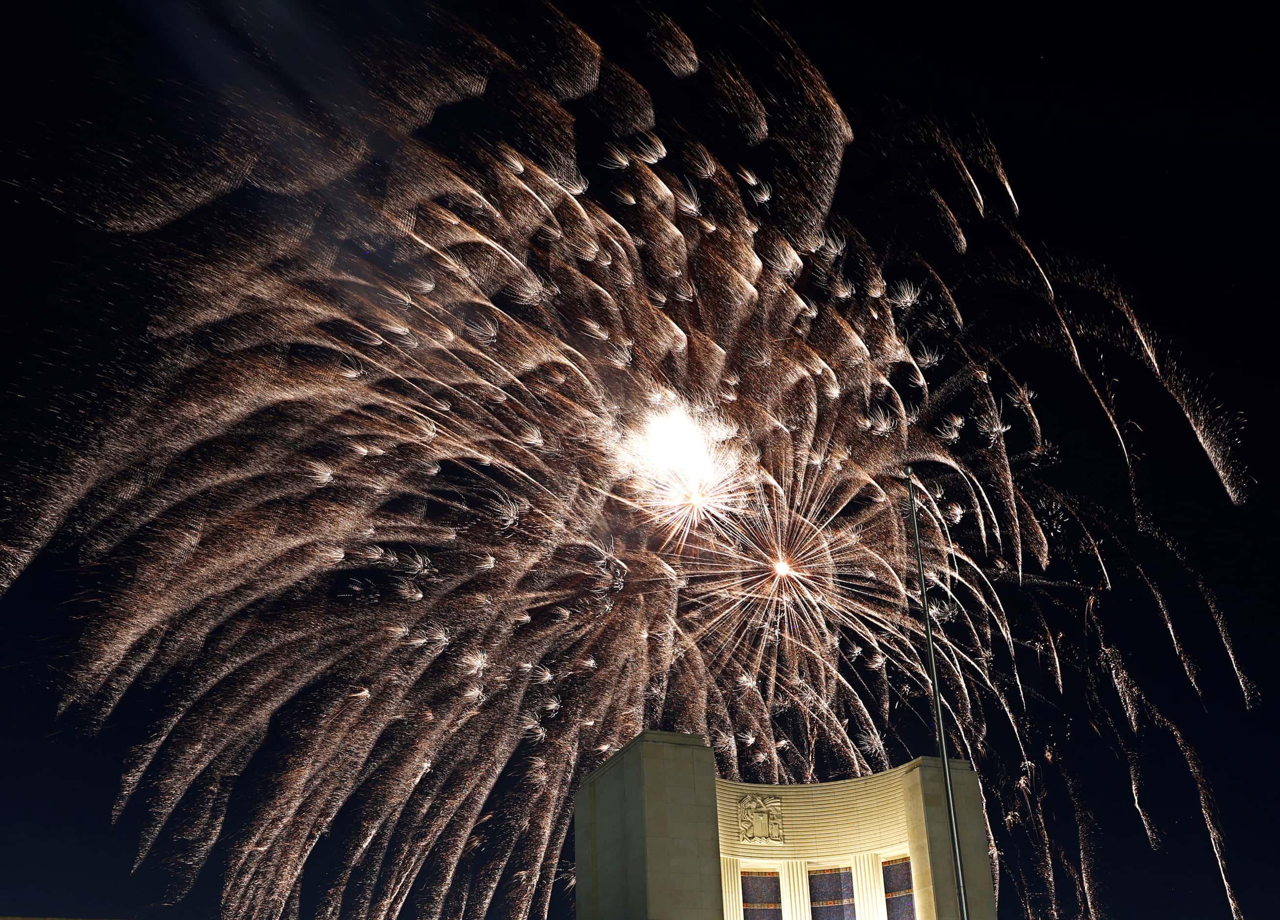 Fireworks explode during the Fair Park Fourth celebration in Fair Park, Thursday, July 4,...