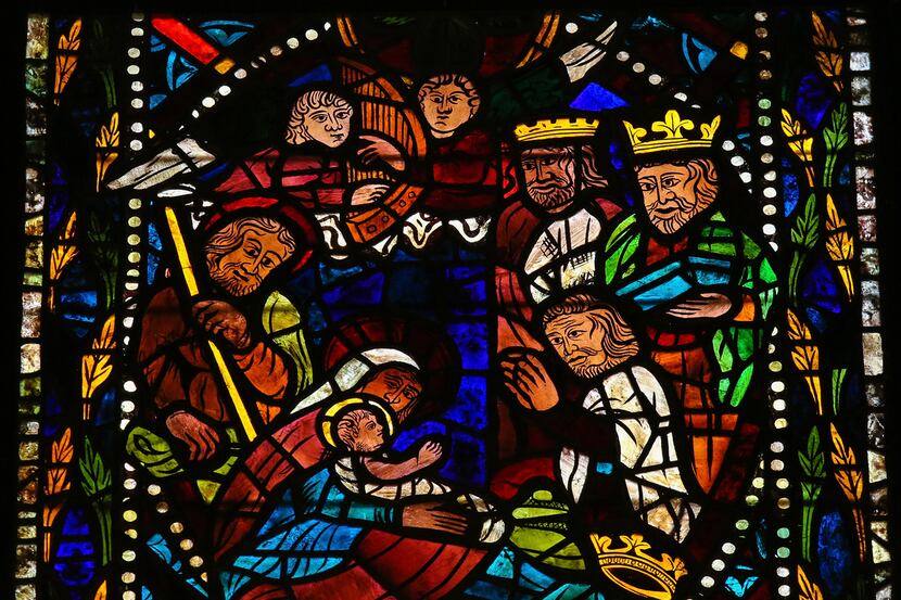 Stained glass window depicting a Nativity Scene with the Three Magi from the East in the...