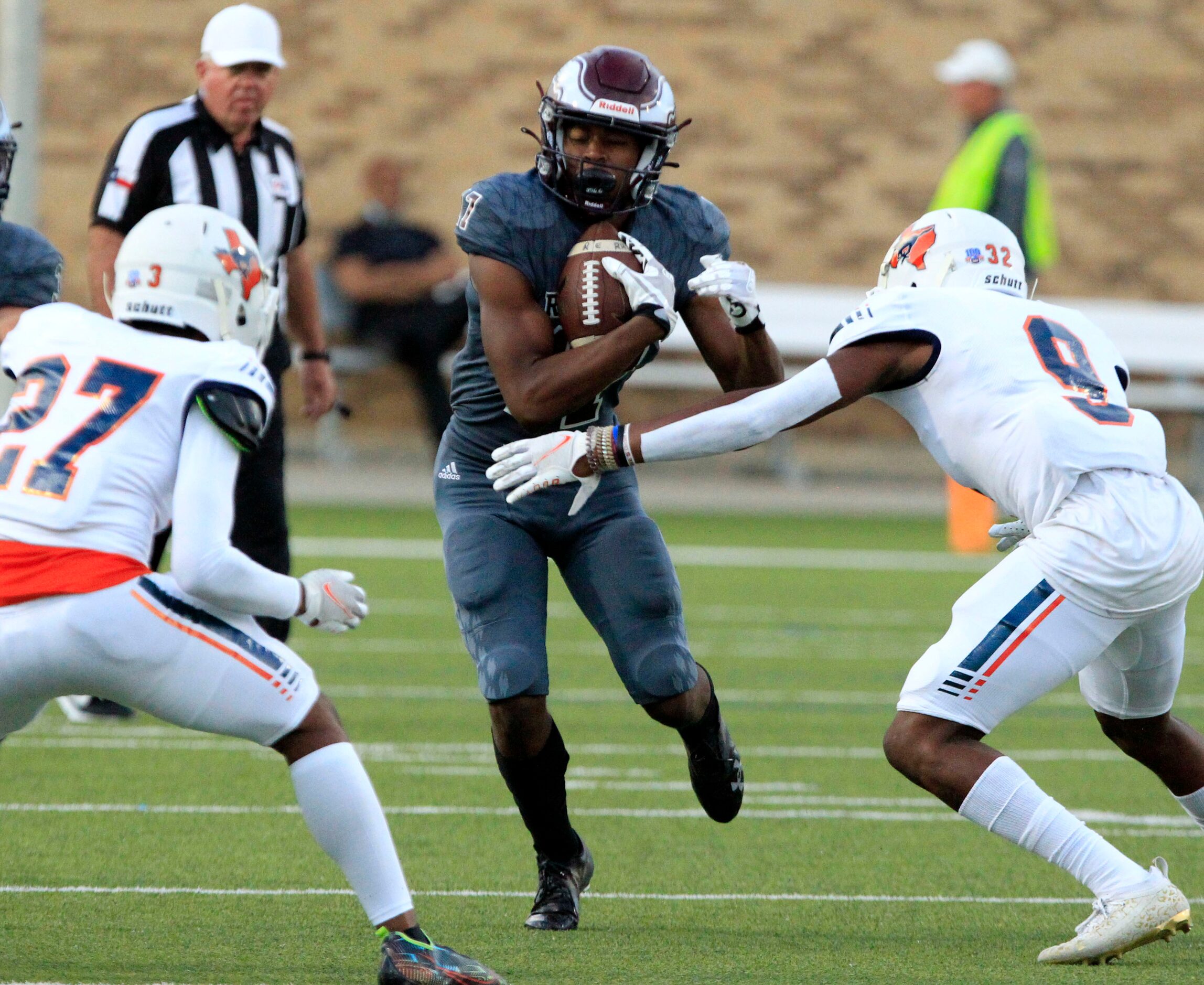 Rowlett’s Trey Long (17) is boxed in by Sachse defenders Landon Mumphrey (27) and Leon...