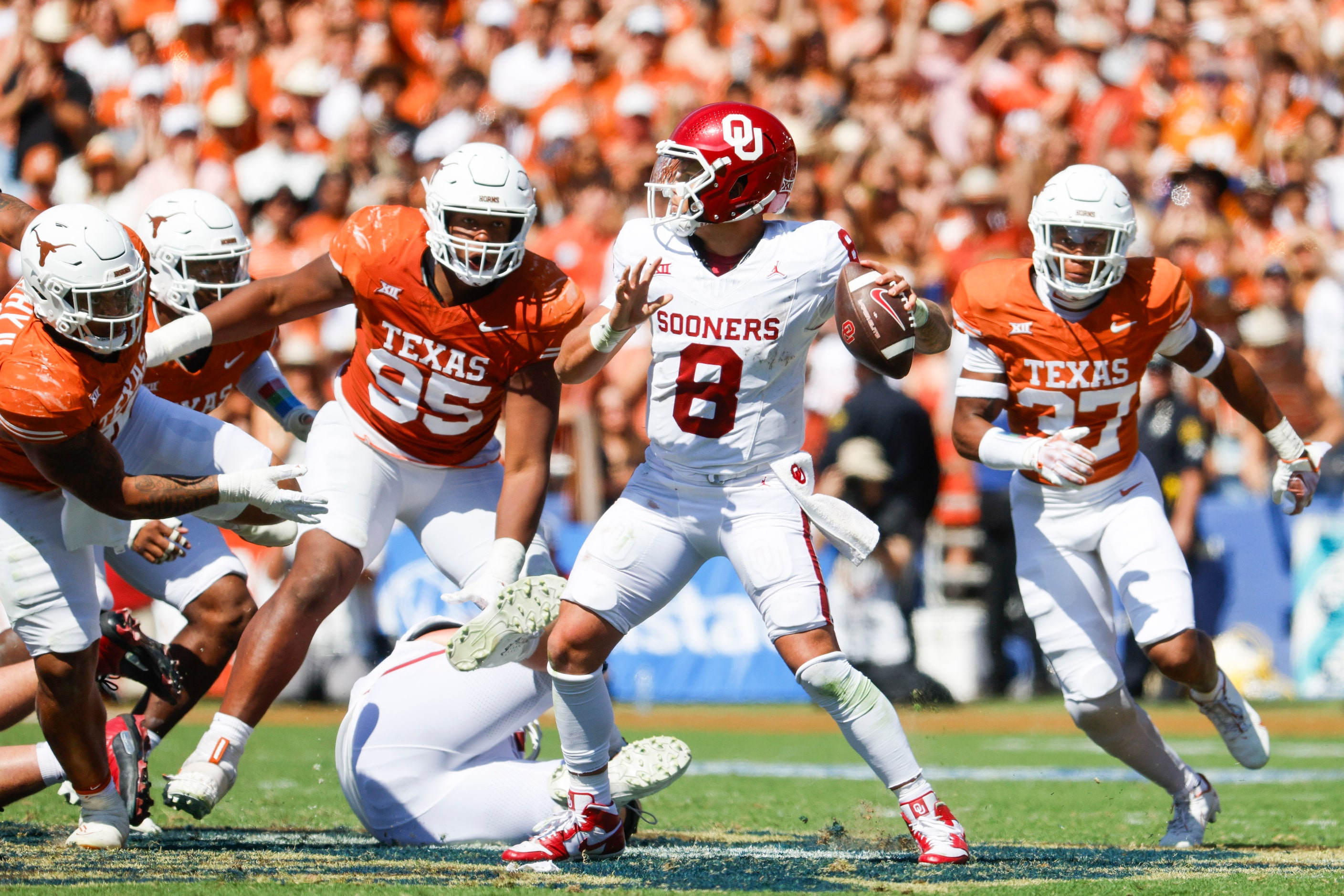 Oklahoma quarterback Dillon Gabriel throws the ball during the second half of Red River...