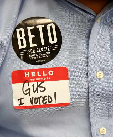 Gus Cantarero wears a Democratic Senate candidate Beto O'Rourke sticker during a campaign...