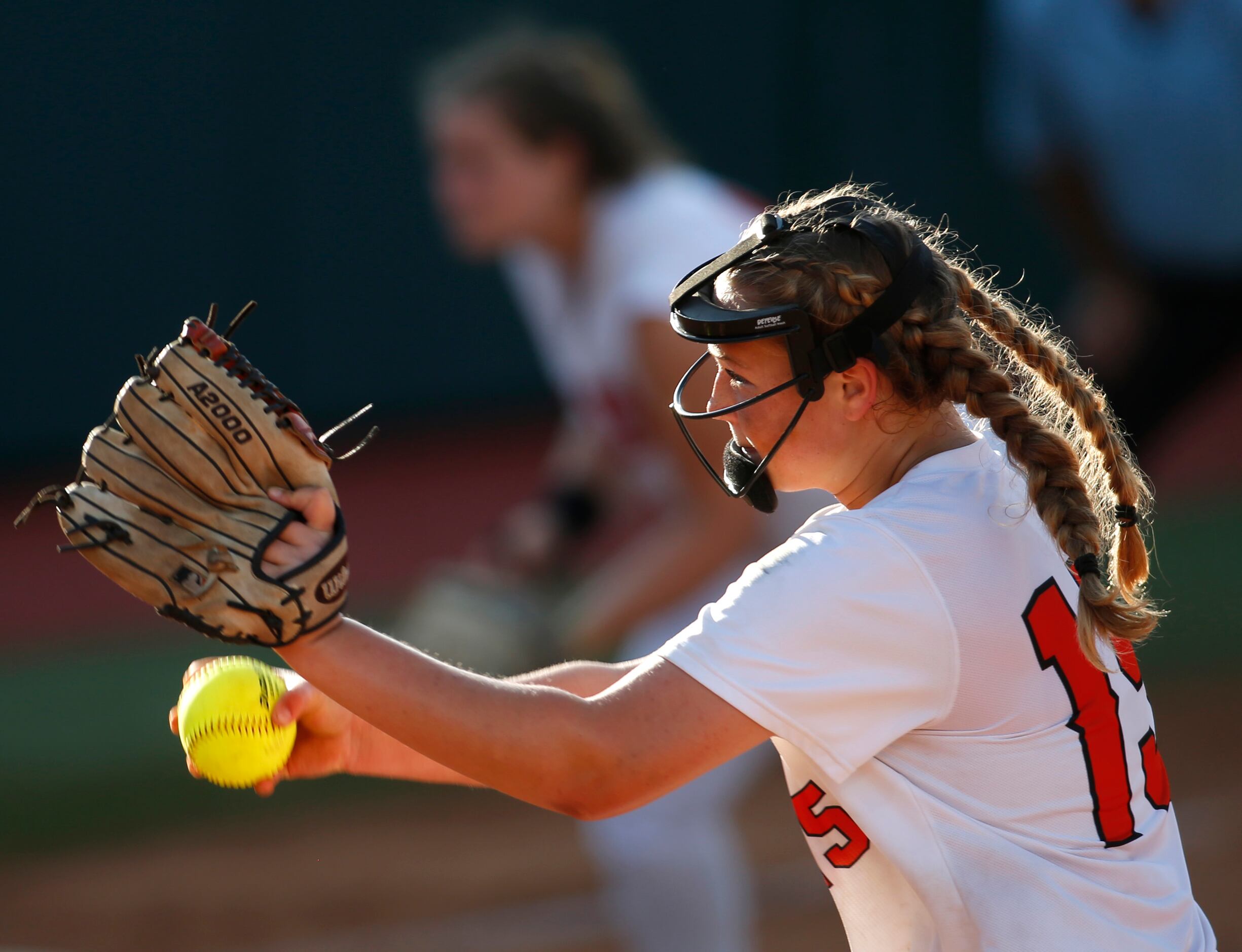 Aledo pitcher Kayleigh Smith (15) prepares to deliver a pitch to a Barbers Hill batter...