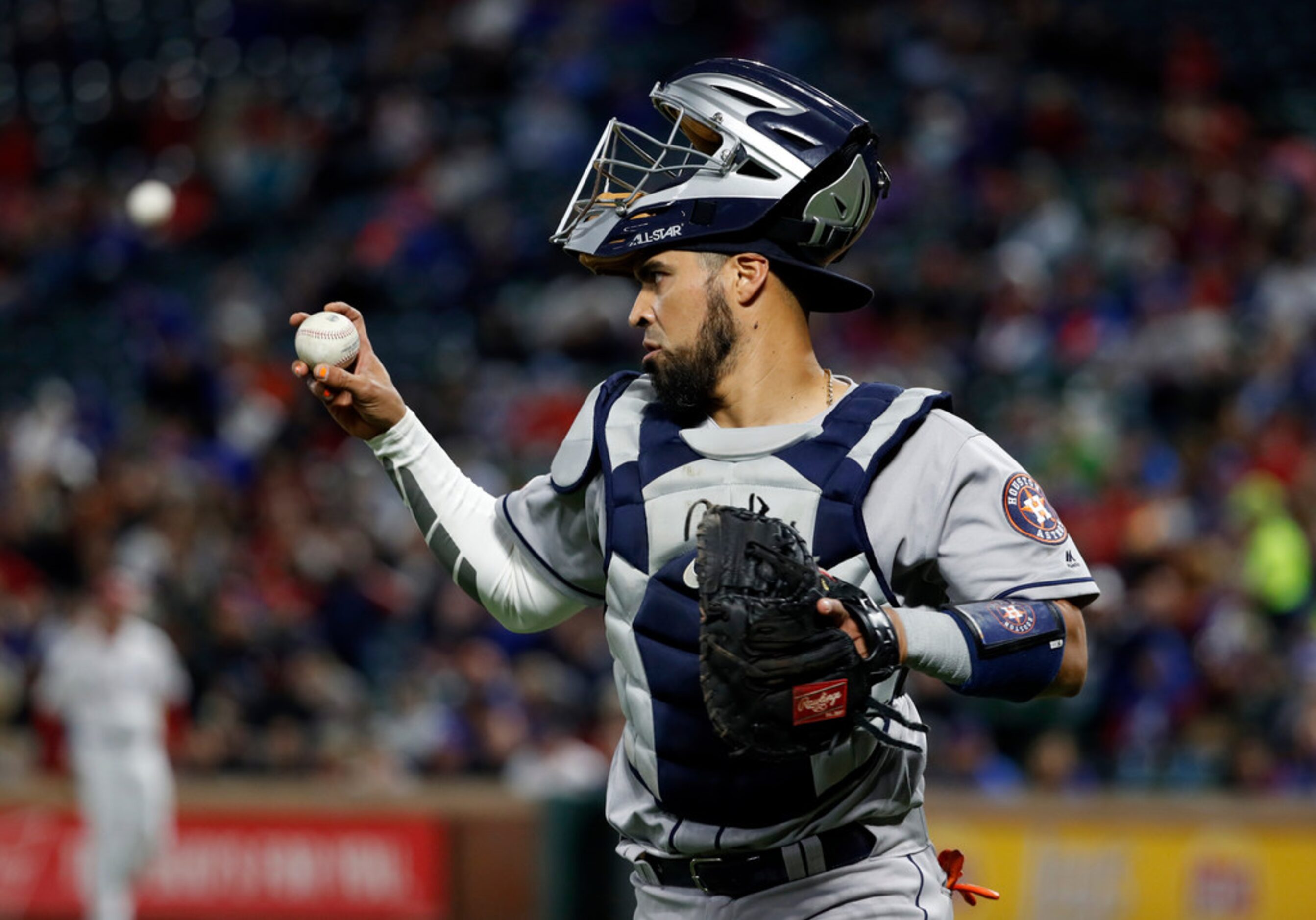 Houston Astros catcher Robinson Chirinos gestures to starting pitcher Brad Peacock, not...