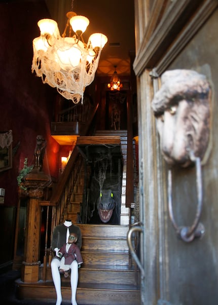 The grand staircase at the 'Munsters' house in Waxahachie has a moving middle section where...
