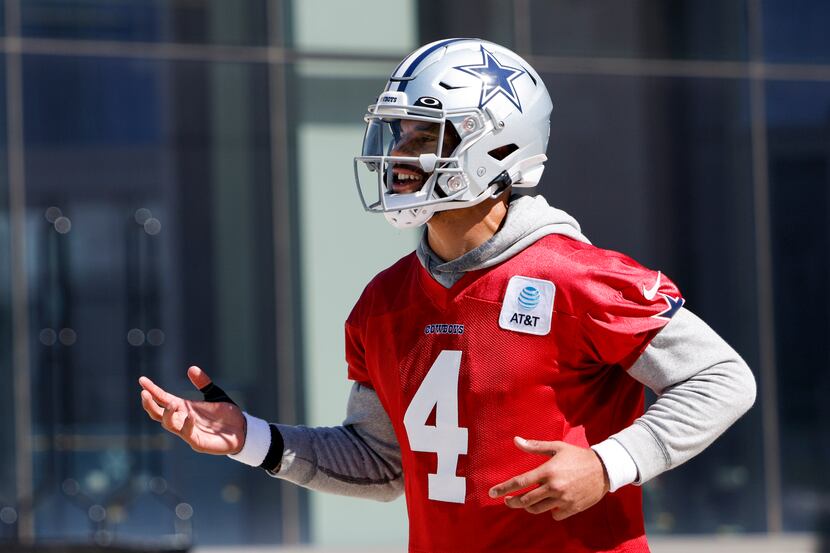 Dallas Cowboys quarterback Dak Prescott (4) talks to reporters during a practice at The...