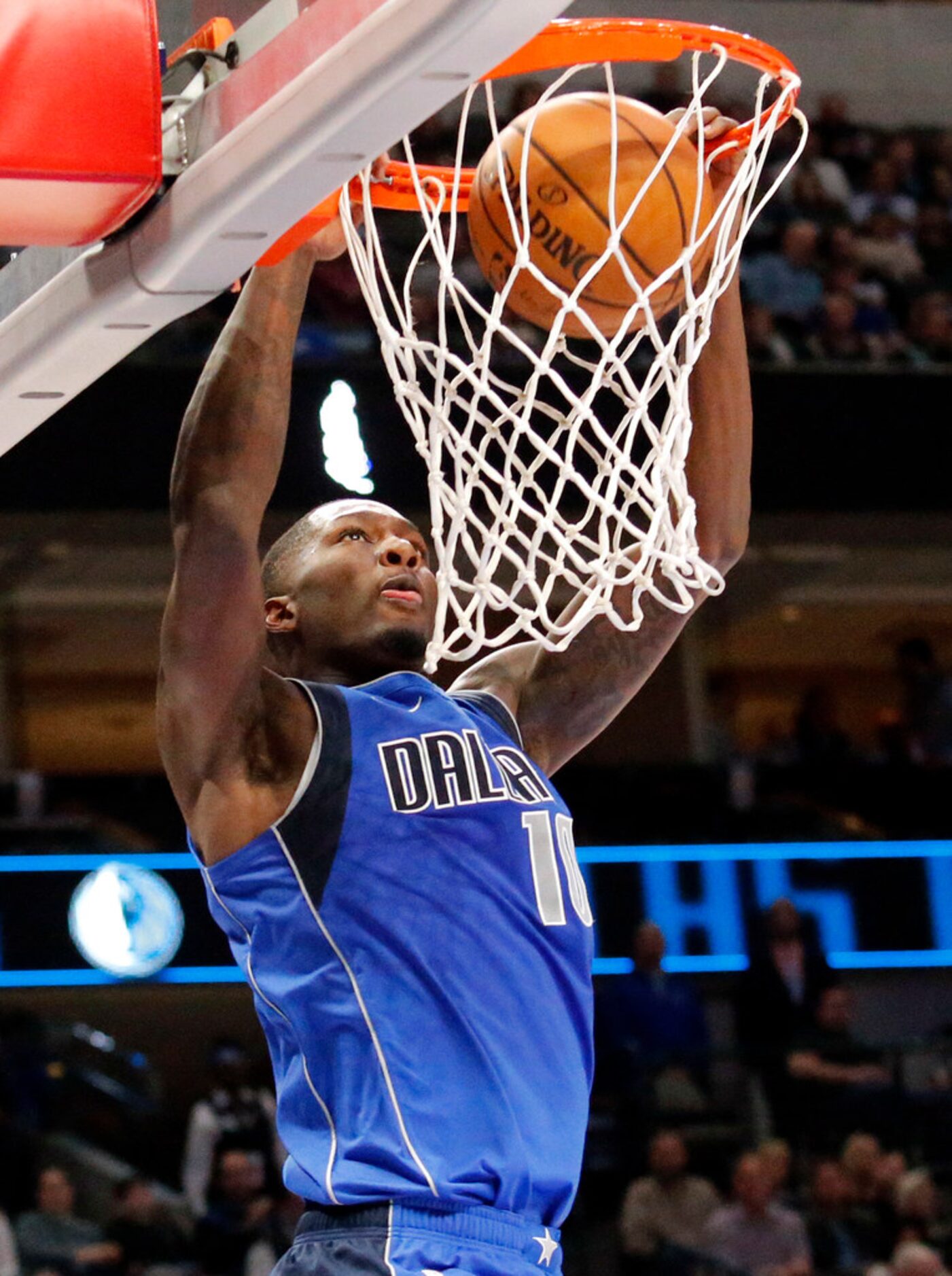 Dallas Mavericks forward Dorian Finney-Smith (10) dunks the ball in the second half against...