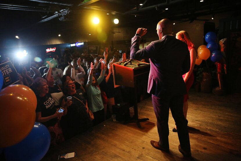 Colin Allred greets supporters with his wife Aly Eber during an election night party at...