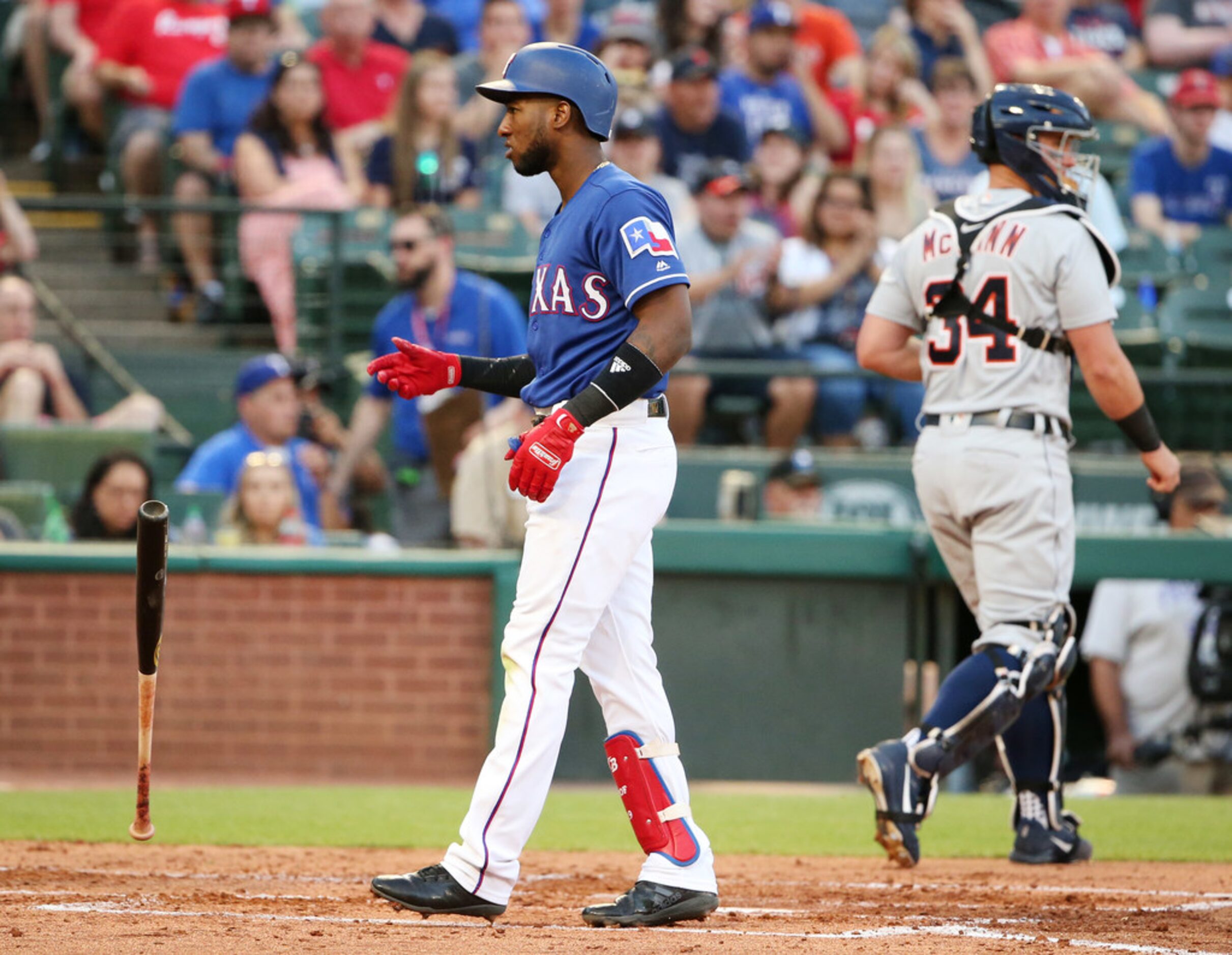 Texas Rangers shortstop Jurickson Profar (19) strikes out to end the second inning in a...