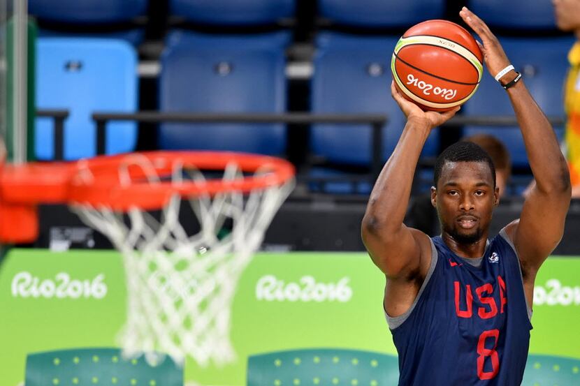 USA's forward Harrison Barnes shoots during a basketball training session at the Carioca...