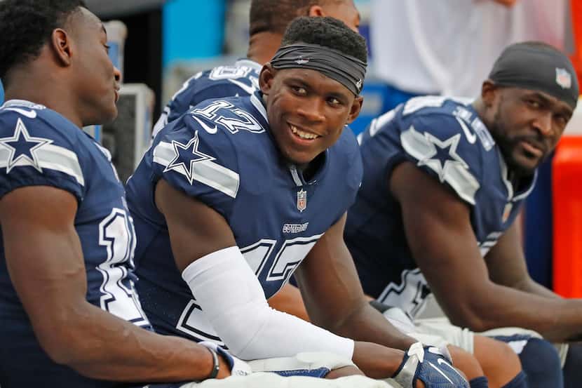 FILE - Dallas Cowboys wide receiver Allen Hurns (17) talks with teammates on the bench...