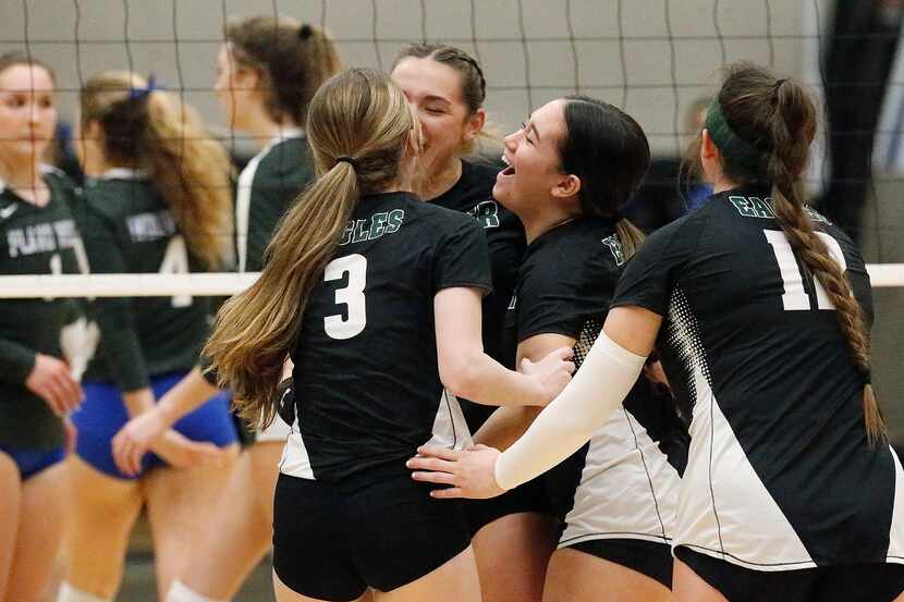 Prosper setter Callie Kieffer (1) celebrates a point with teammates during Tuesday's...