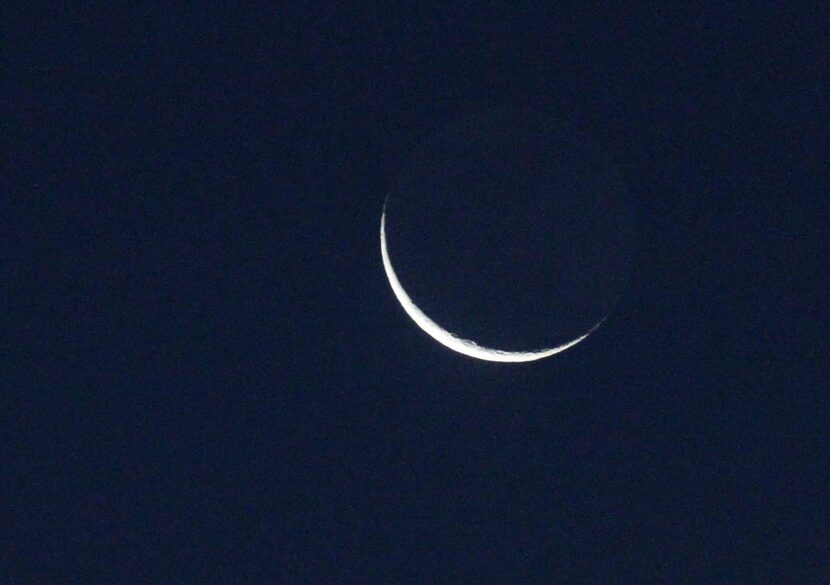 The waning crescent moon in the predawn Dallas sky signals the beginning of a renewed gift...