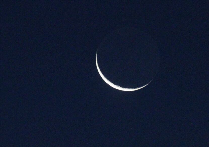 The waning crescent moon in the predawn Dallas sky signals the beginning of a renewed gift...
