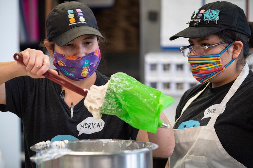 Haute Sweets Patisserie owner-chef Tida Pichakron (left) worked on holiday orders alongside...