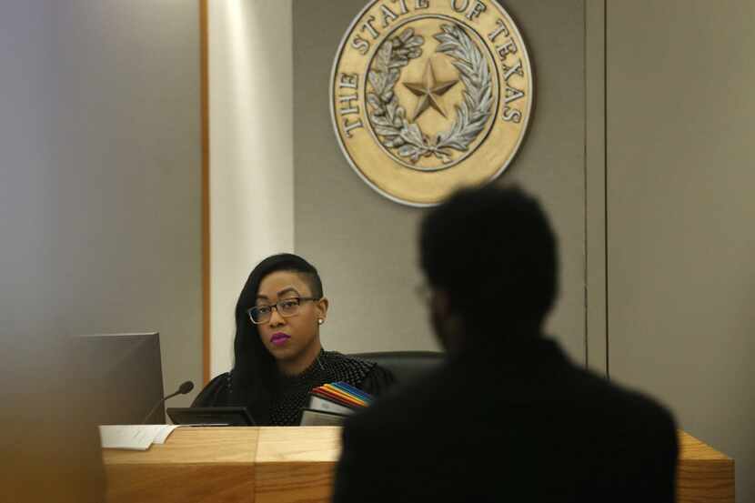 Fifteen criminal defense lawyers are trying to get embattled Dallas judge Amber Givens-Davis...