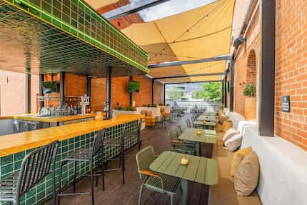 Culpepper Cattle Co. in Deep Ellum has a side patio at the edge of the historic building....