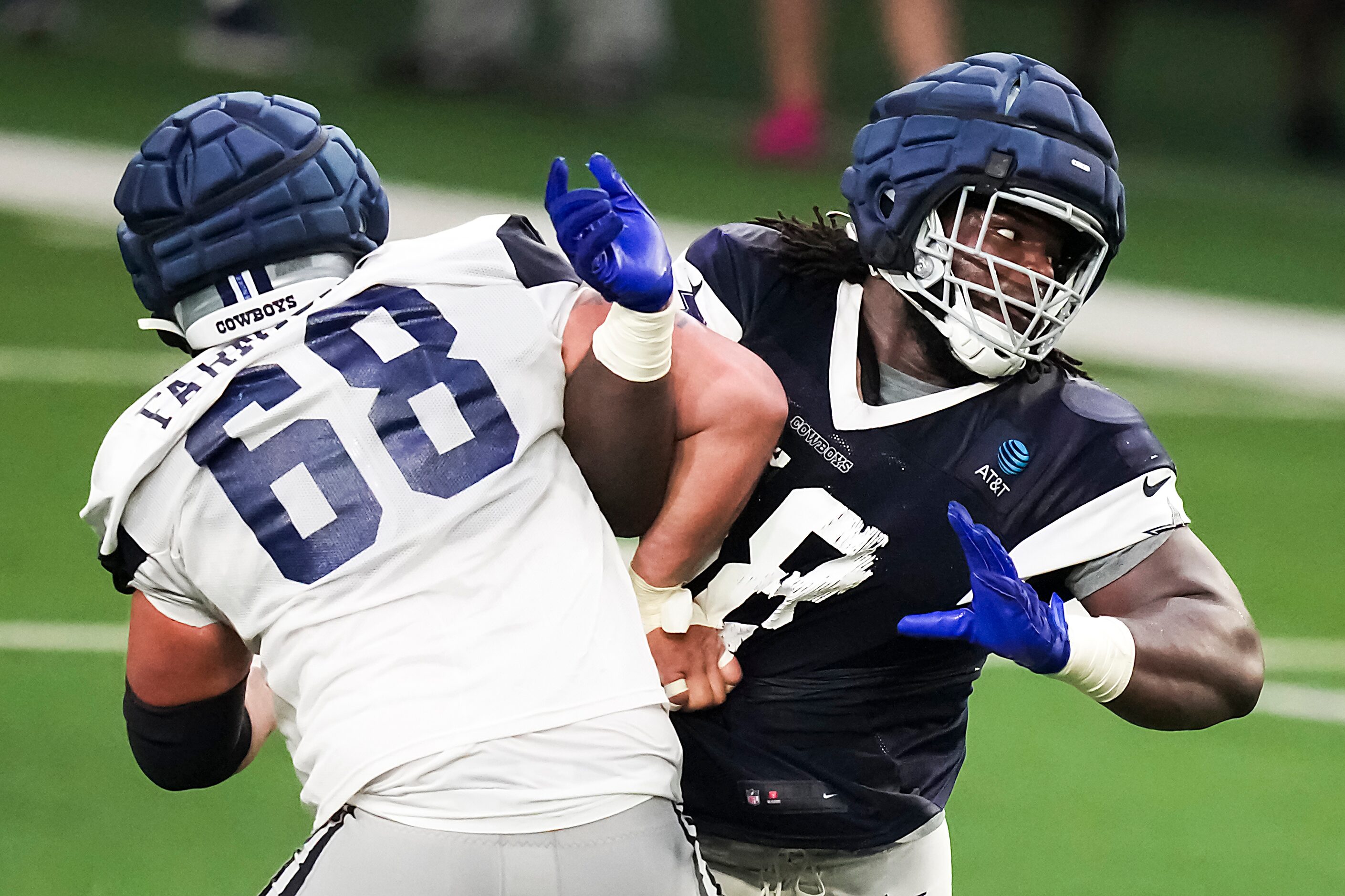 Dallas Cowboys defensive tackle Mazi Smith (58) works against offensive lineman Matt Farniok...