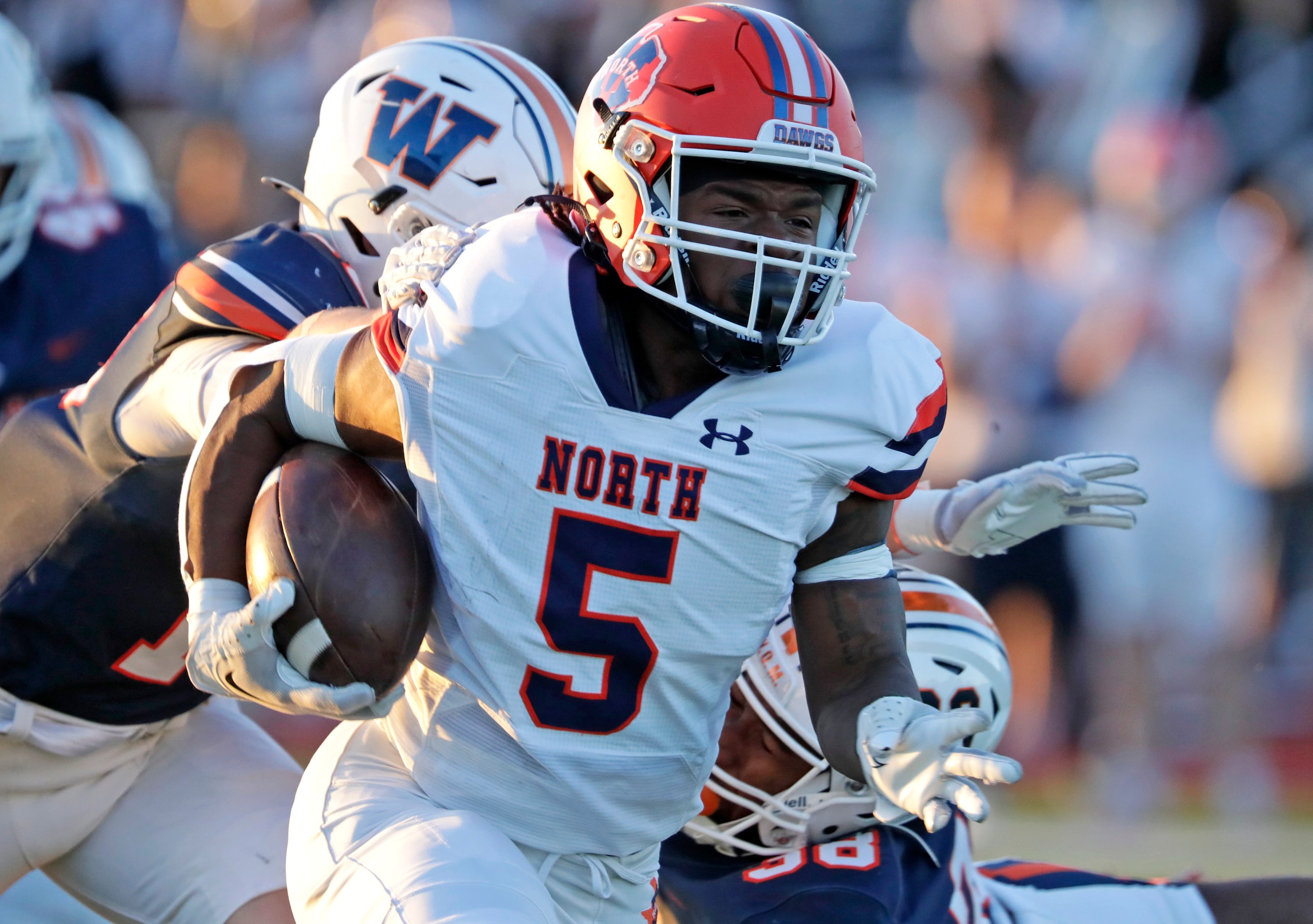 McKinney North High School running back Greg Ard (5) runs for a touchdown on his first carry...