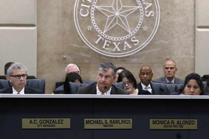Dallas City Manager, A.C. Gonzalez, (from left), Dallas Mayor, Mike Rawlings, and Dallas Pro...