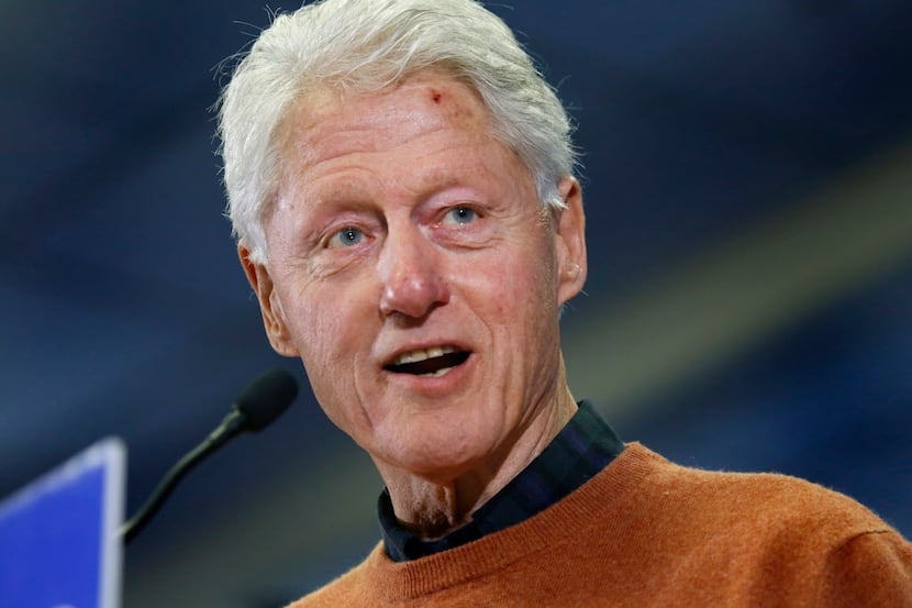 Former President Bill Clinton talks to voters about Hillary Clinton in Concord, N.H., on...