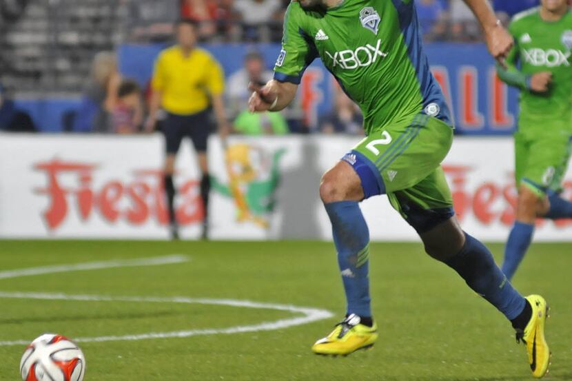 Seattle Sounders Clint Dempsey (2) pushes forward against FC Dallas during a Major League...