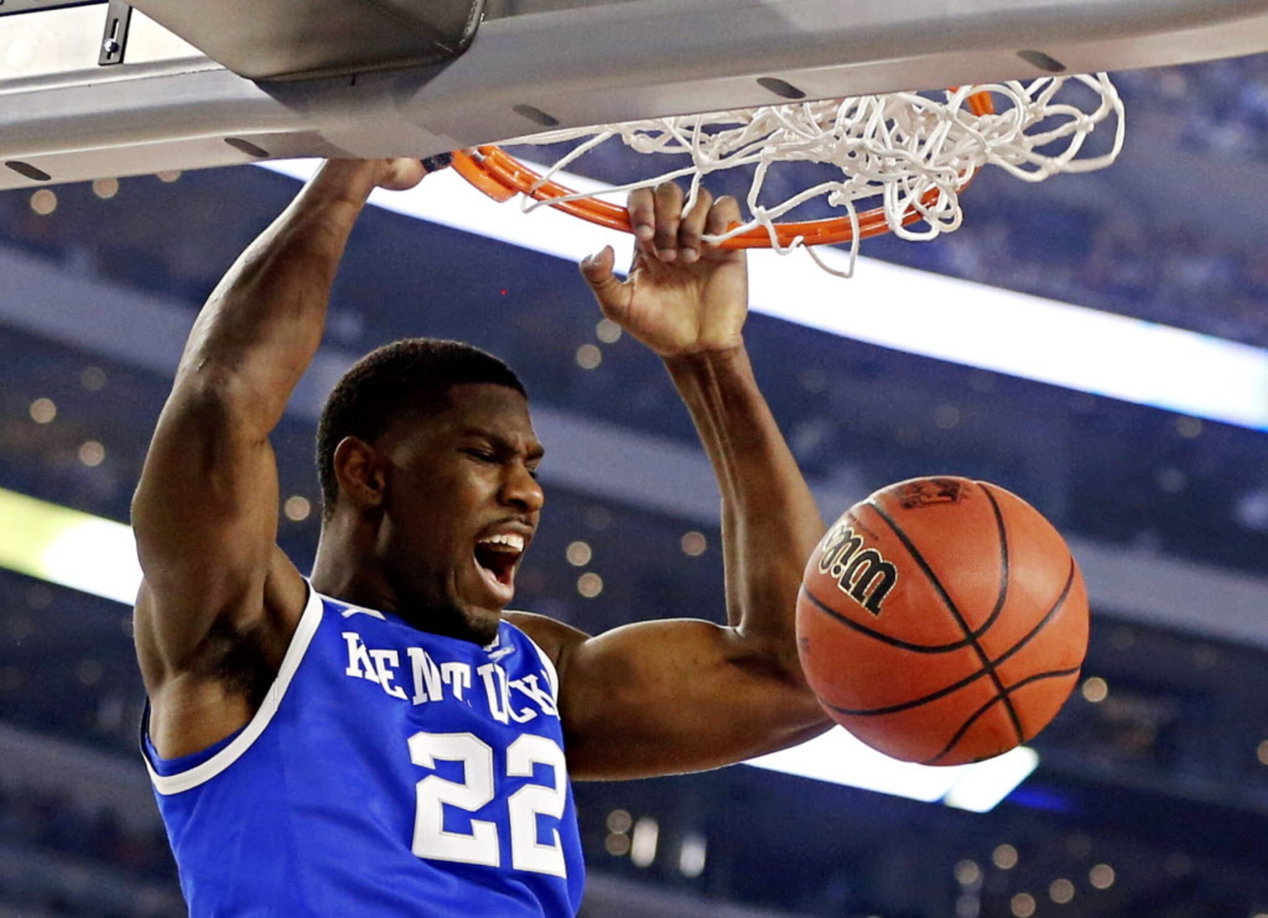 Kentucky Wildcats forward Alex Poythress dunks the ball during the first half of their NCAA...