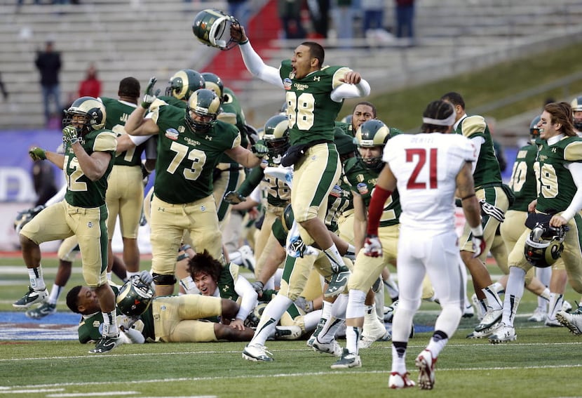 Colorado State players celebrate their win after the NCAA New Mexico Bowl college football...