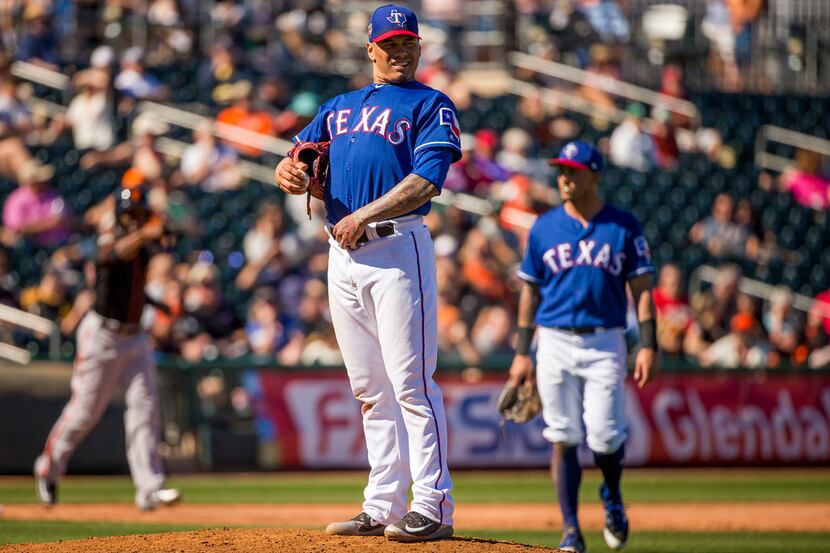 Texas Rangers pitcher Keone Kela waits for manager Jeff Banister to come remove him from the...