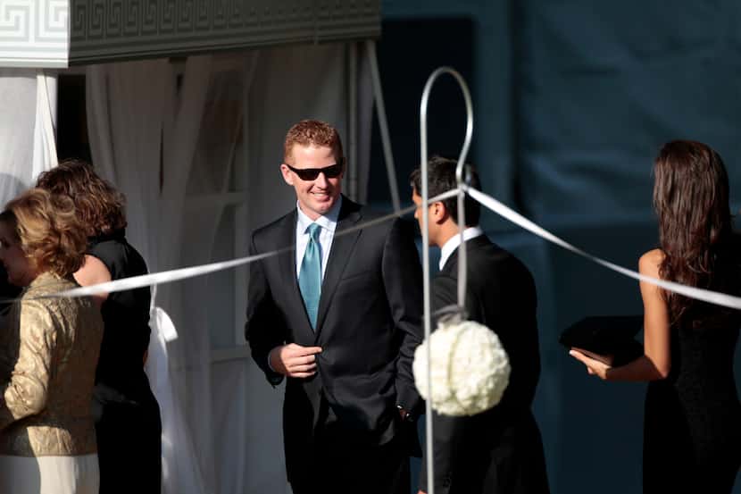 Cowboys head coach Jason Garrett arrives at the wedding of Tony Romo and Candice Crawford at...