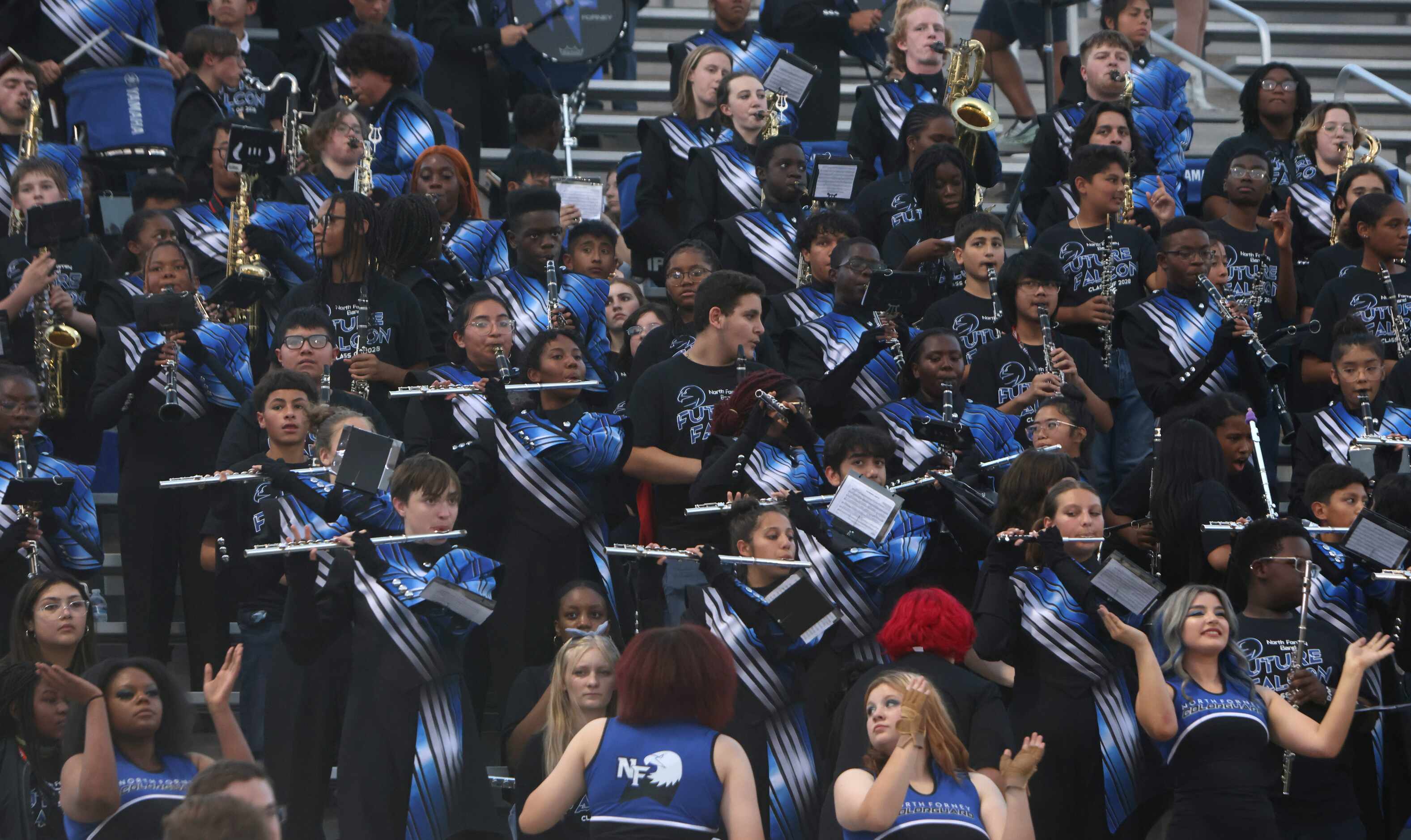 Members of the North Forney band perform in the stands during first quarter action of the...