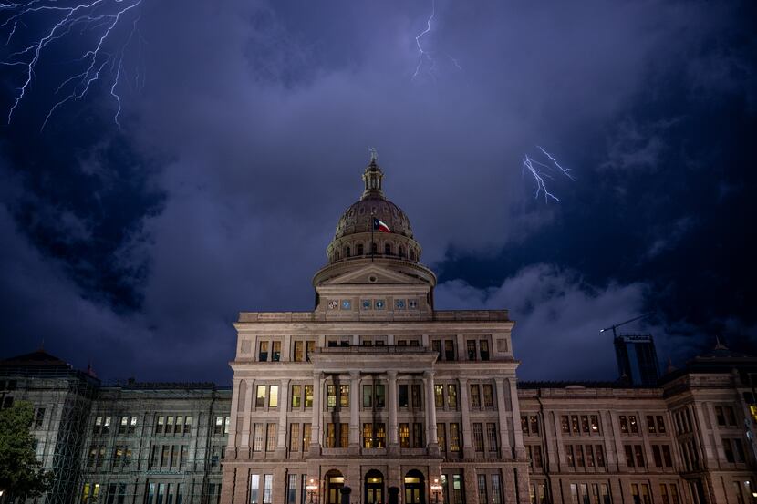 AUSTIN, TEXAS - APRIL 21: The Texas State Capitol is seen in a thunderstorm on April 21,...