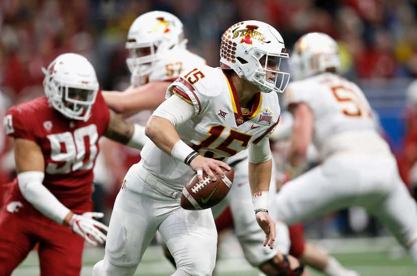 SAN ANTONIO, TX - DECEMBER 28:  Brock Purdy #15 of the Iowa State Cyclones is forced to...