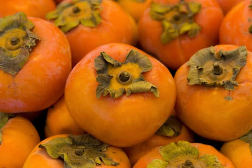 Fuyu persimmons are a flavorful winter fruit. You can eat them out of hand, peeled or...