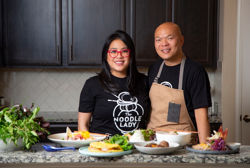 Jennifer Ong-Sikhattana (The Noodle Lady) and her husband, John, pose for a photo in their...