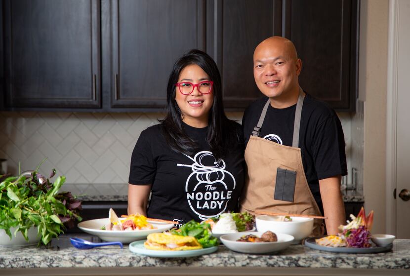 Jennifer Ong-Sikhattana (The Noodle Lady) and her husband, John, pose for a photo in their...
