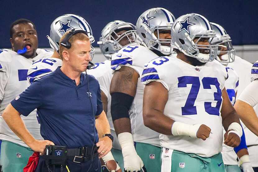 Dallas Cowboys head coach Jason Garrett watches from the sidelines with offensive guard...