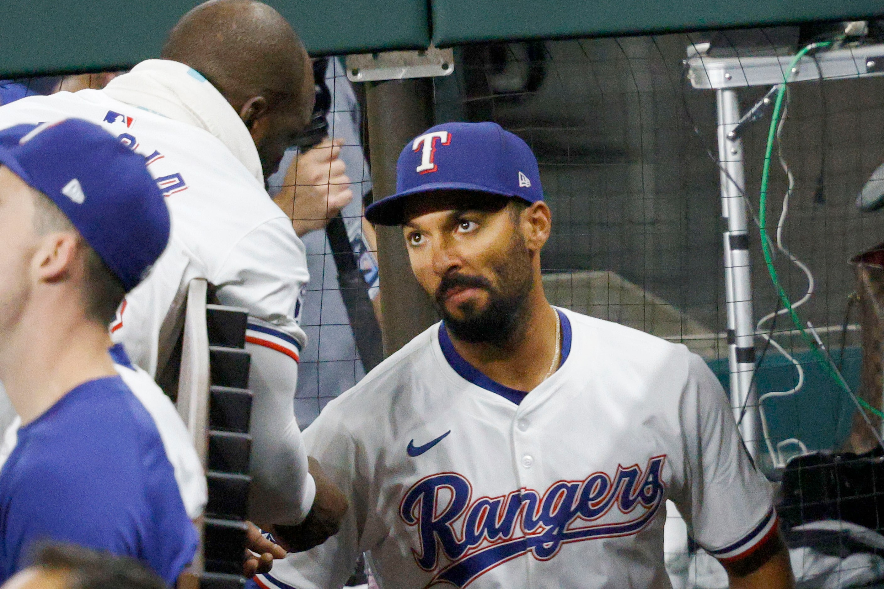 Texas Rangers second base Marcus Semien (2) talks with Texas Rangers designated hitter...