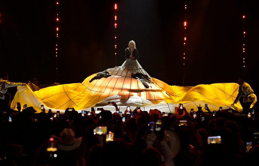 Dolly Parton performs "World On Fire" at the 58th annual Academy of Country Music Awards on...