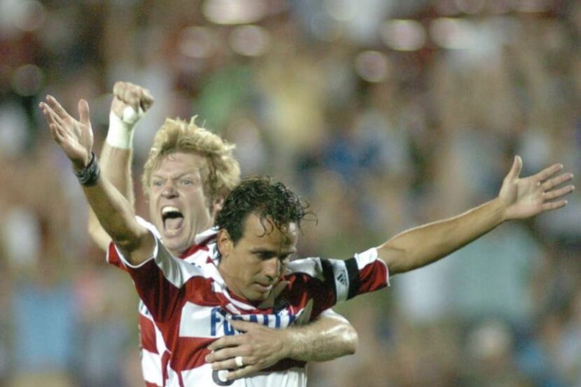 Two of the club's most iconic players, Pareja celebrates his final goal scored for FC Dallas...