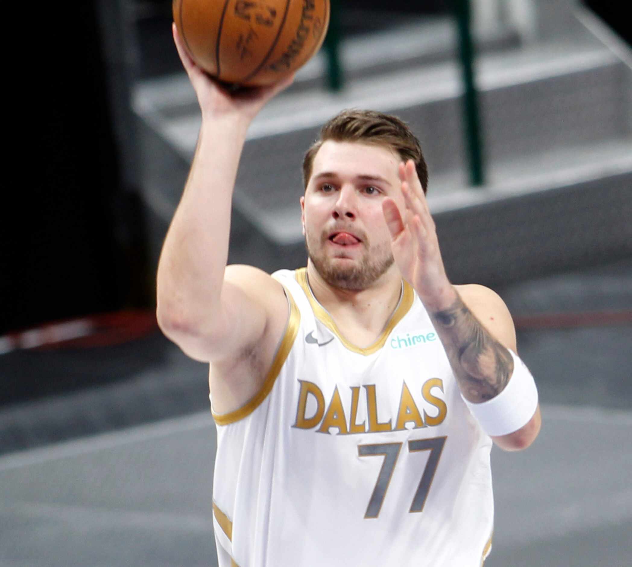 Dallas Mavericks point guard Luka Doncic (77) puts up an uncontested jump shot during first...