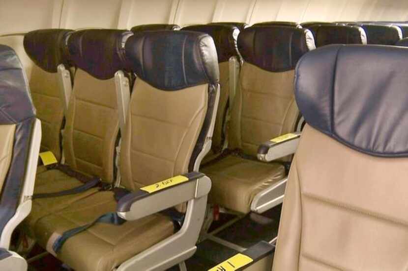 
Dallas-based Southwest took away 1 inch from each row on some jets to make room for six...