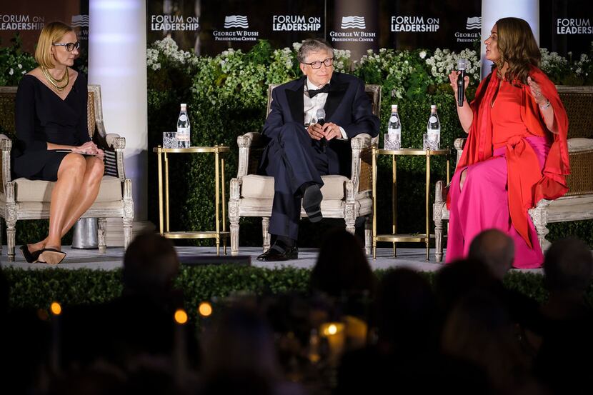 Bill and Melinda Gates participate in a conversation with moderator Holly Kuzmich (left)...