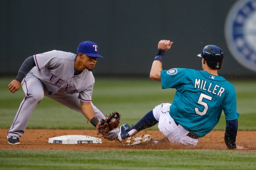 SEATTLE, WA - JUNE 13: Second baseman Rougned Odor #73 of the Texas Rangers tags out Brad...