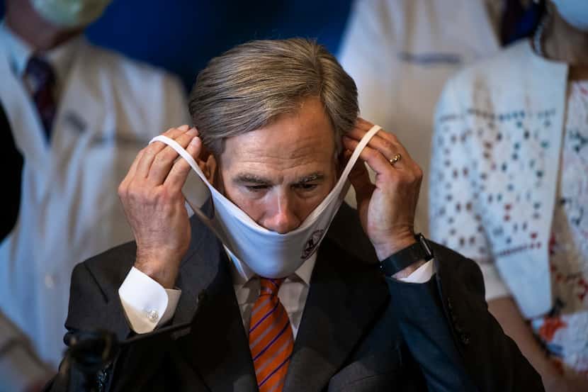Texas Governor Greg Abbott speaks during a press conference following a roundtable...