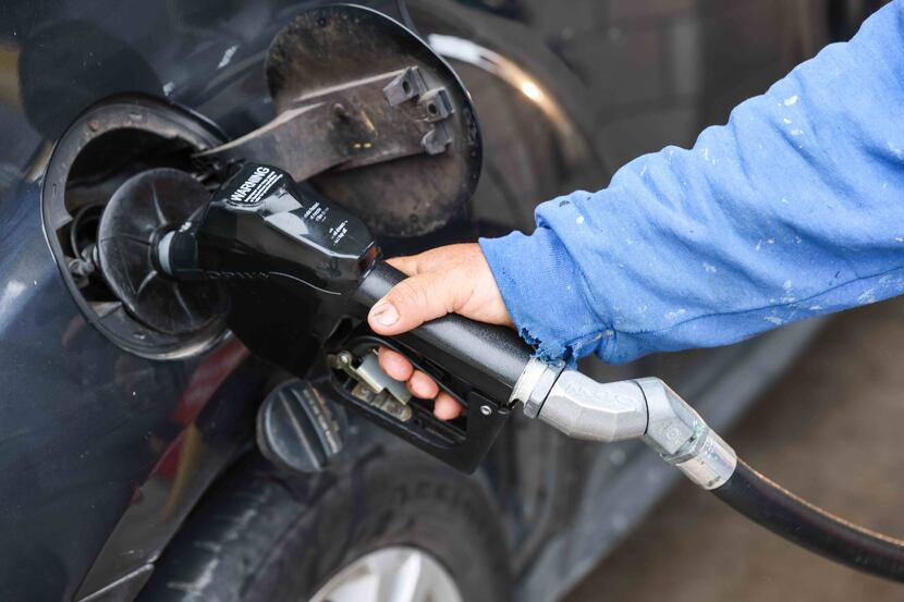 Ignacio Vazquez put gas in his vehicle at the Sam's Club gas station on Retail Road in...