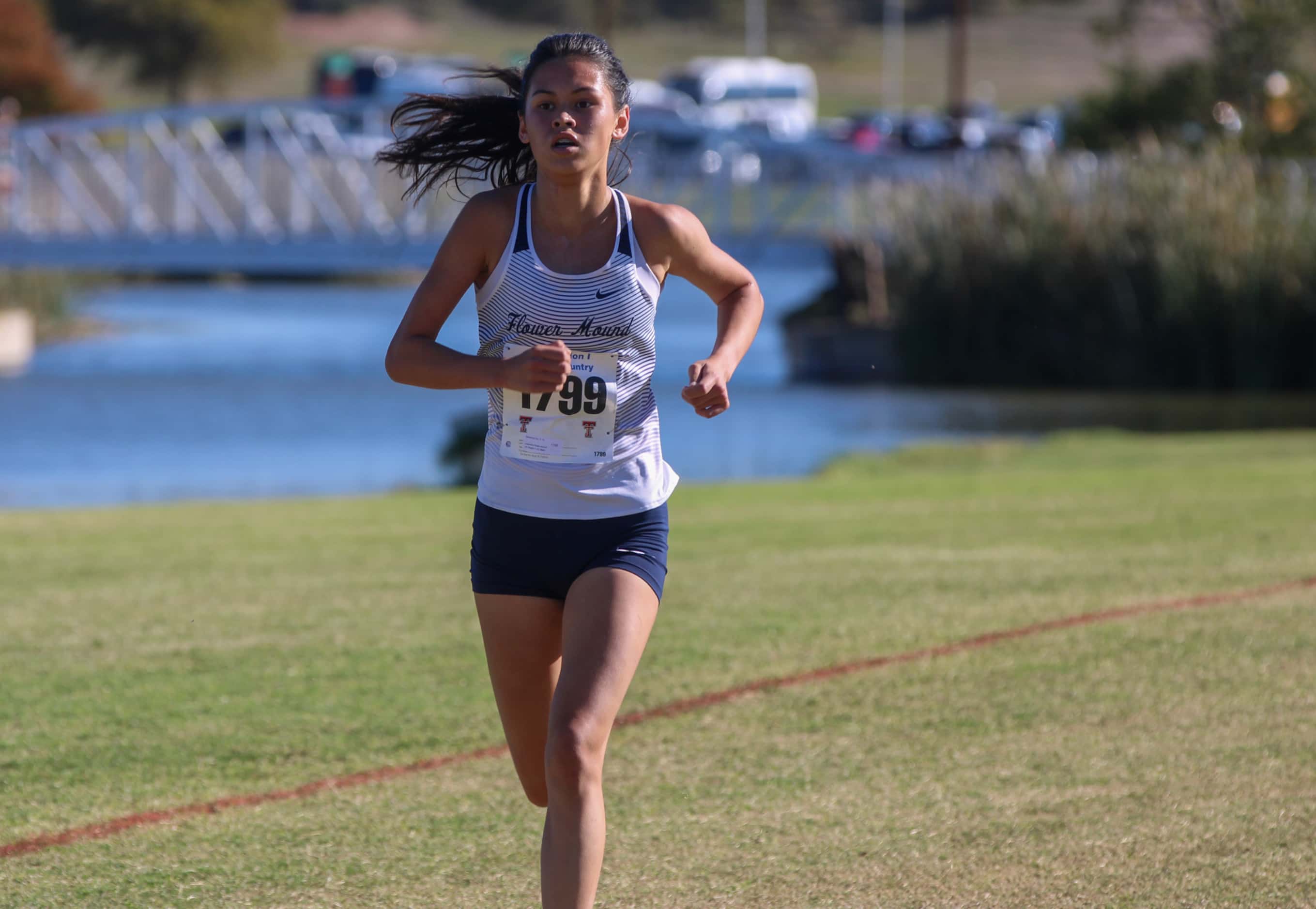 Flower Mound’s Alexandra Fox finished third in the Region I-6A girls cross country race on...