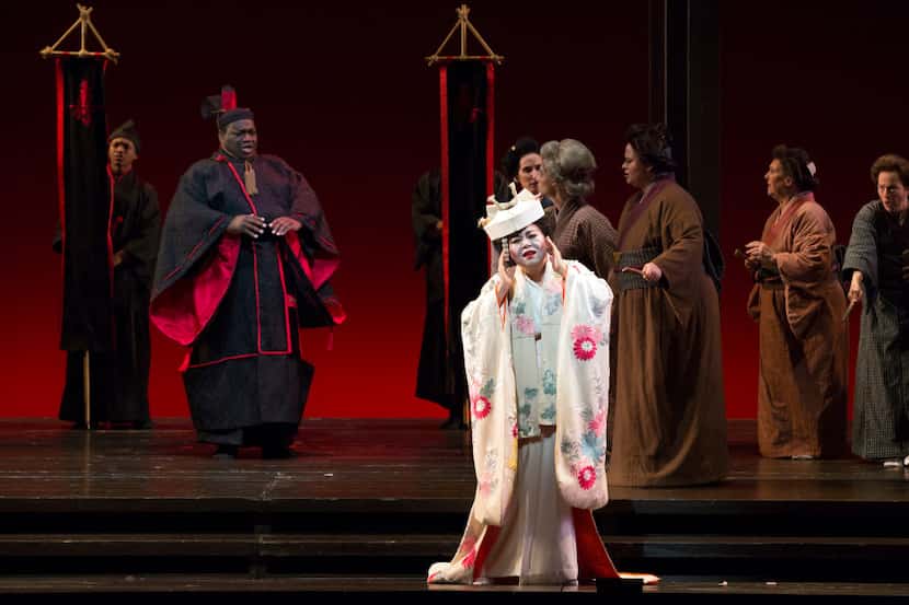 Hui He (CQ) (center) performs in a rehearsal of Dallas Opera's "Madame Butterfly" at...