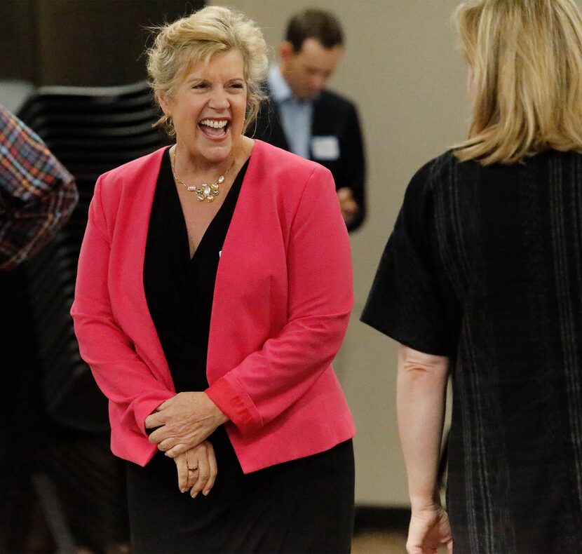 Candidate Lillian Salerno greets guests in attendance before a forum by the North Texas...