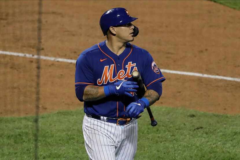 New York Mets' Wilson Ramos reacts after striking out during the ninth inning of a baseball...